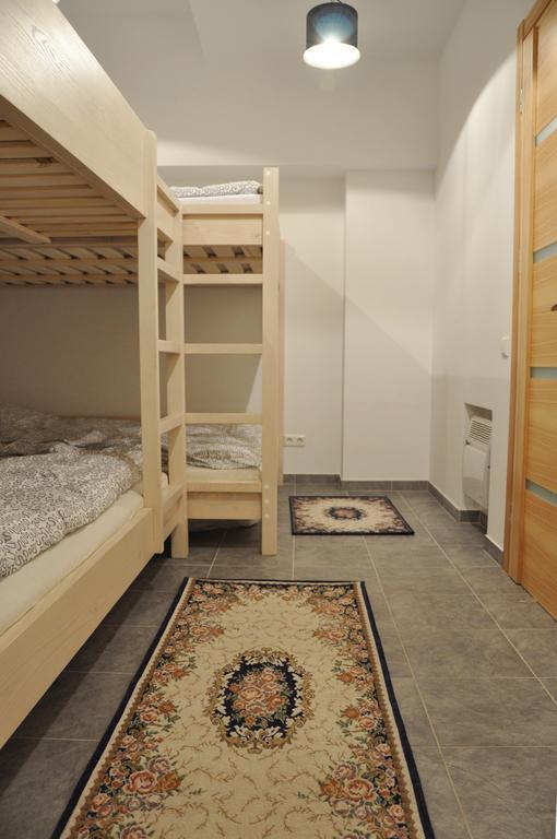 Bomb Shelter Apartment VNO Pokoj fotografie